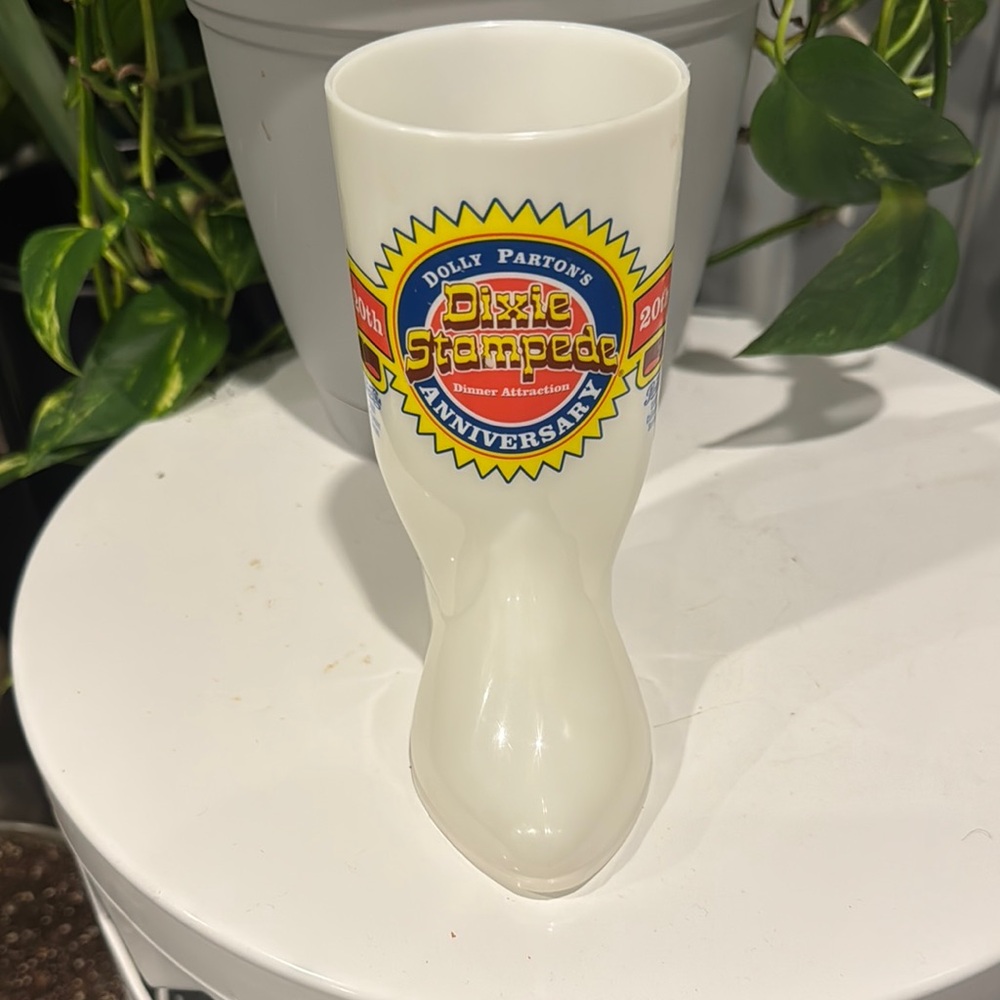 DOLLY PARTON’s Dixie Stampede White Boot-Shaped Mug w/ 20th Anniversary Graphic